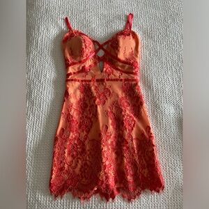 Bebe Orange Plunge Dress with Red/Orange Accents Size 00